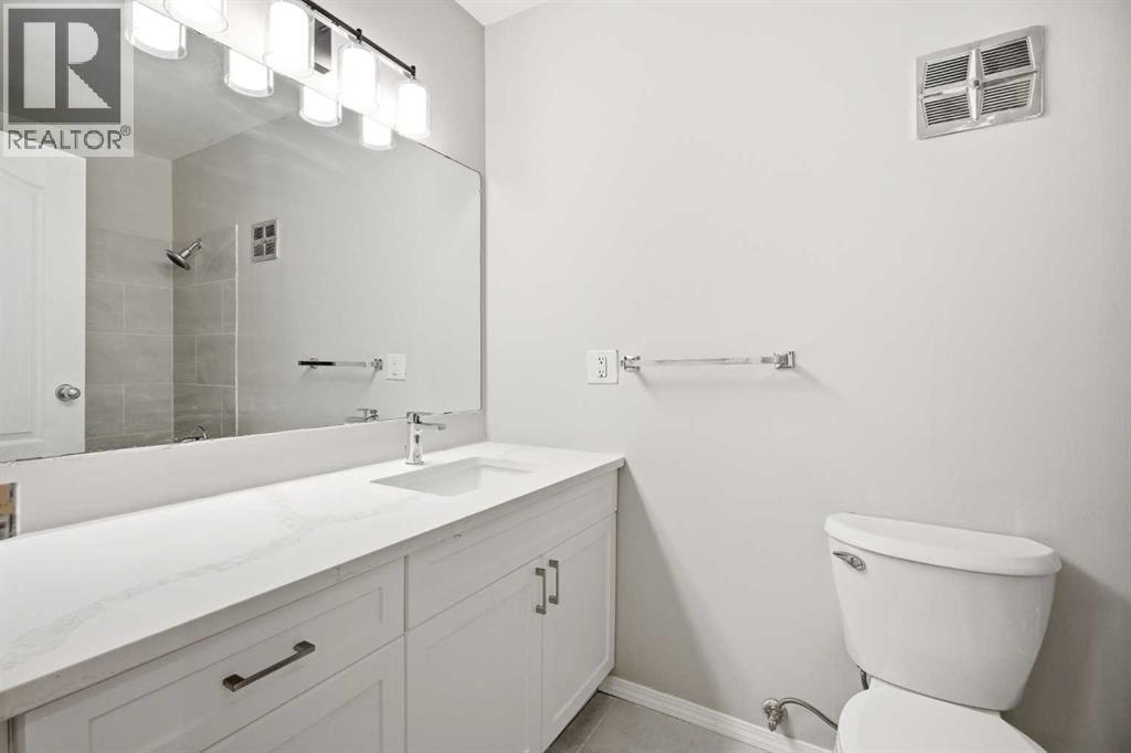 11018 5 Street SW, Calgary, Alberta  T2W 1Y6 - Photo 8 - A2308887