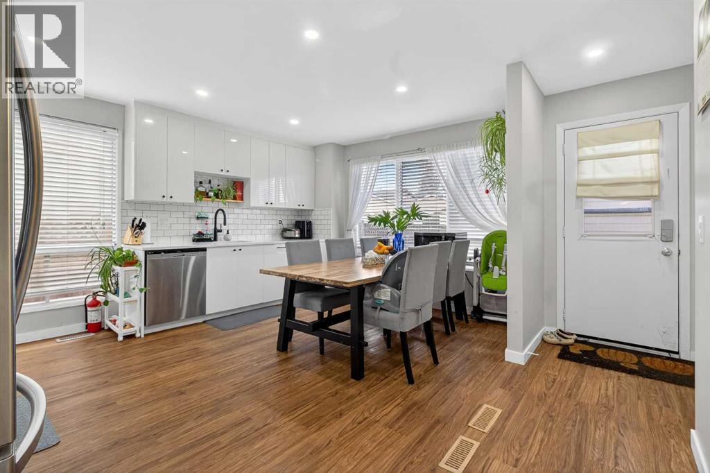 1451 Berkley Drive Nw, Calgary, Alberta  T3K 1T6 - Photo 6 - A2273015