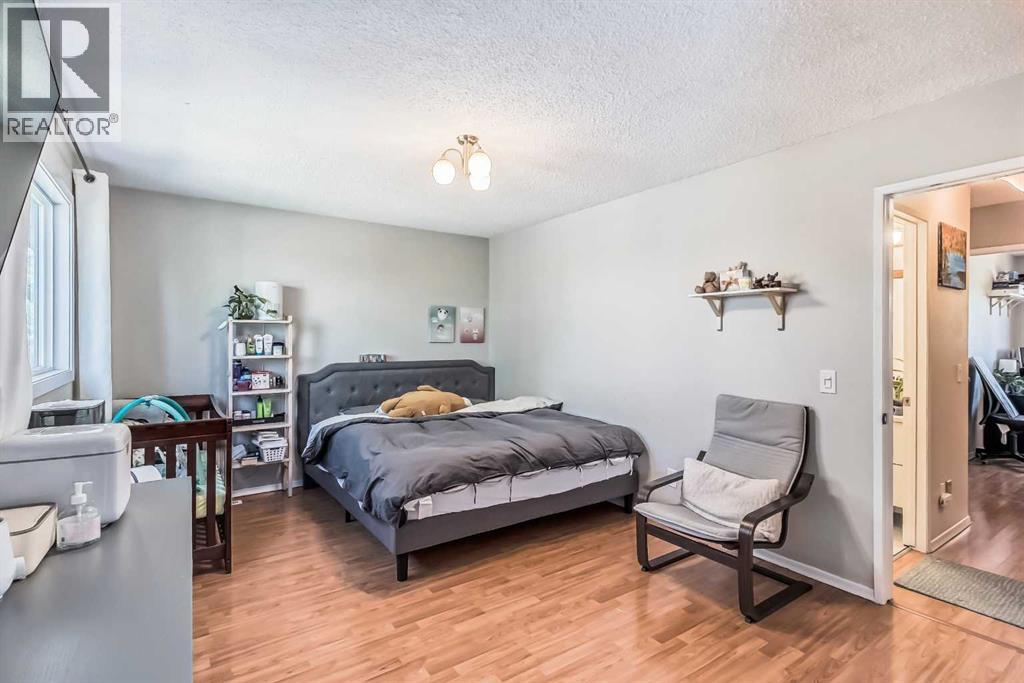 1451 Berkley Drive Nw, Calgary, Alberta  T3K 1T6 - Photo 19 - A2273015
