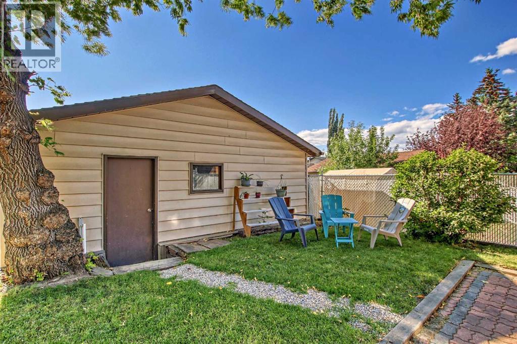 1451 Berkley Drive Nw, Calgary, Alberta  T3K 1T6 - Photo 41 - A2273015