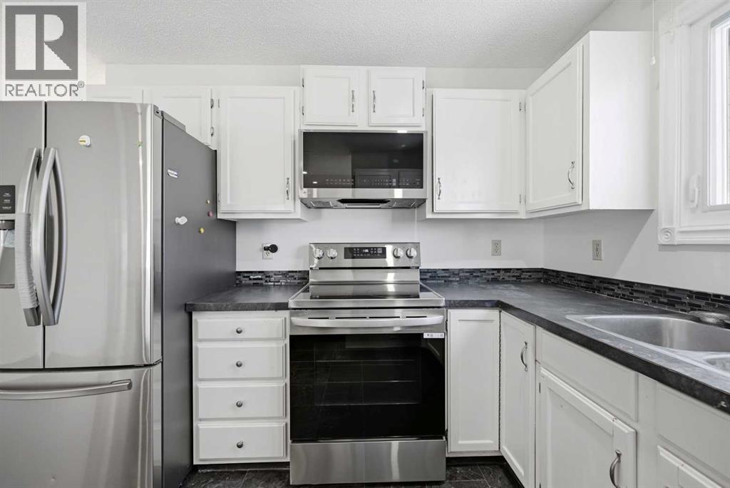 92 Whitlock Close Ne, Calgary, Alberta  T1Y 4X3 - Photo 12 - A2305994