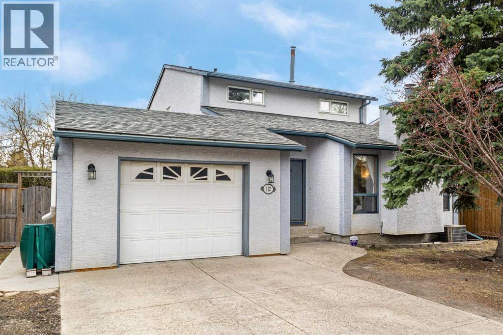112 Woodglen Road SW, Calgary, Alberta  T2W 4Z1 - Photo 1 - A2308841