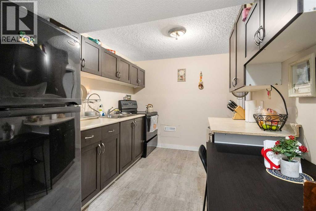 112 Woodglen Road SW, Calgary, Alberta  T2W 4Z1 - Photo 35 - A2308841