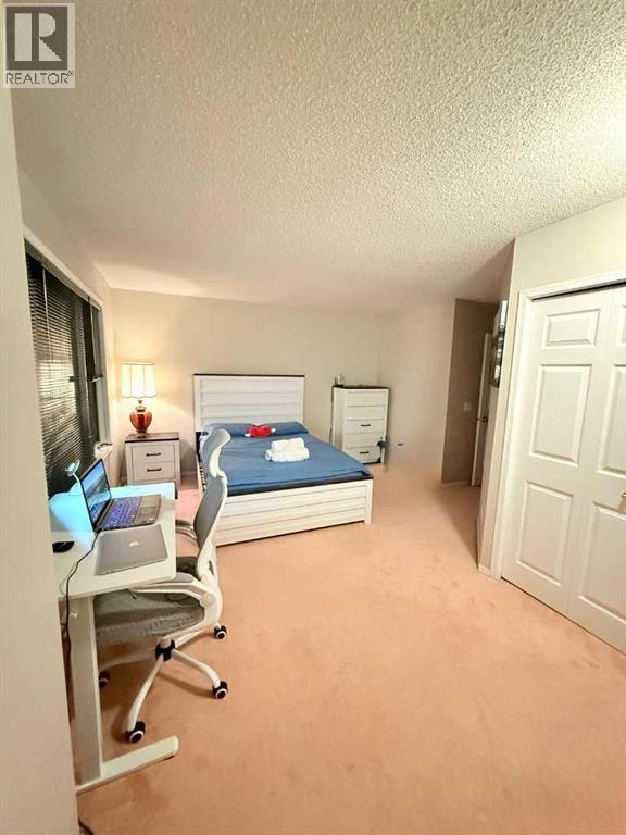 7212 Sierra Morena Boulevard SW, Calgary, Alberta  T3H 3G5 - Photo 14 - A2308935
