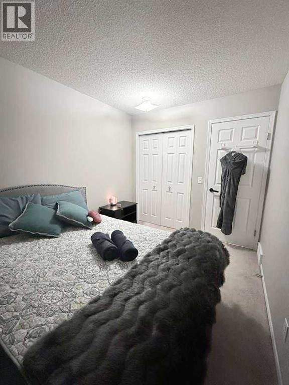 7212 Sierra Morena Boulevard SW, Calgary, Alberta  T3H 3G5 - Photo 16 - A2308935