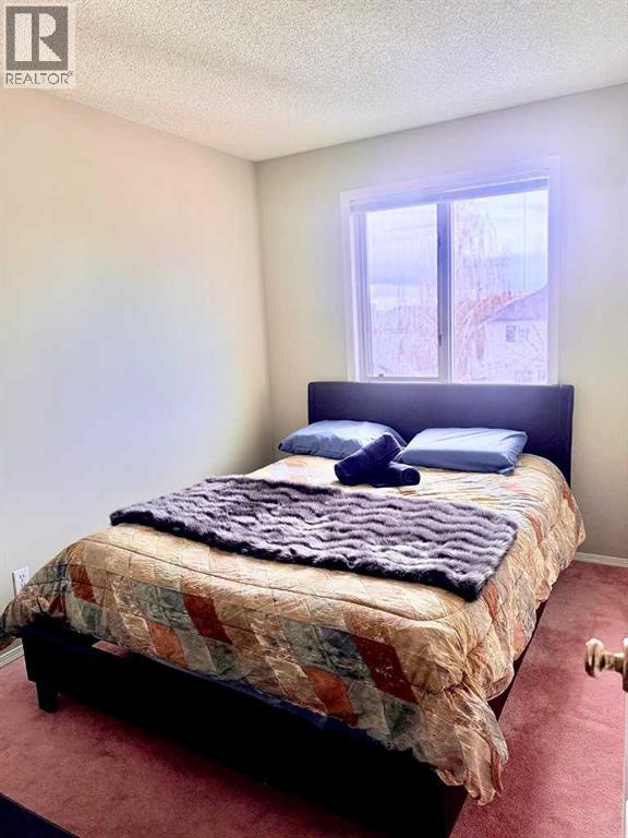 7212 Sierra Morena Boulevard SW, Calgary, Alberta  T3H 3G5 - Photo 18 - A2308935