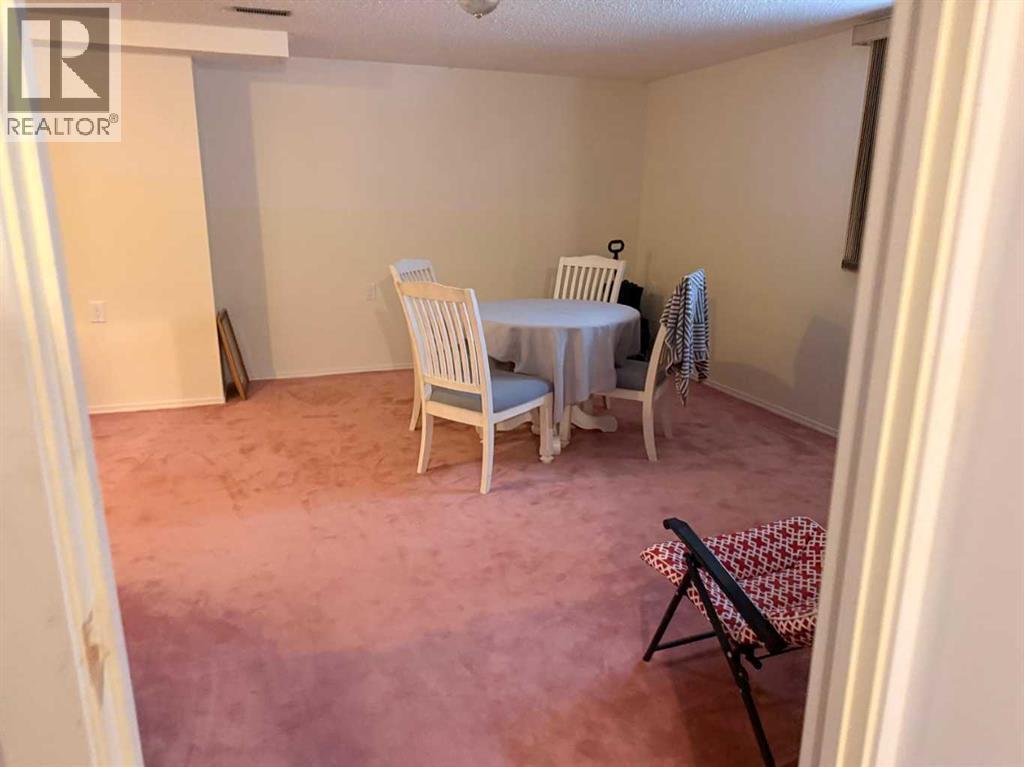 7212 Sierra Morena Boulevard SW, Calgary, Alberta  T3H 3G5 - Photo 23 - A2308935