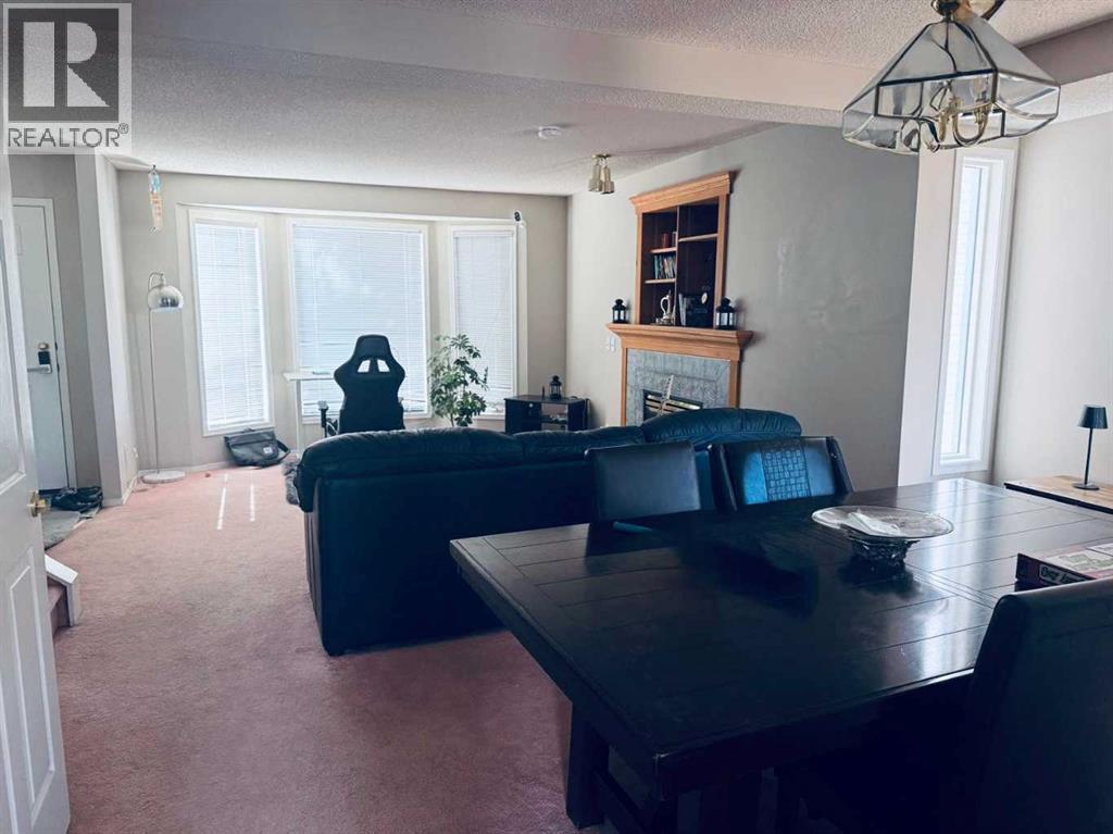 7212 Sierra Morena Boulevard SW, Calgary, Alberta  T3H 3G5 - Photo 7 - A2308935