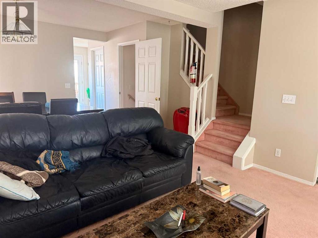 7212 Sierra Morena Boulevard SW, Calgary, Alberta  T3H 3G5 - Photo 4 - A2308935