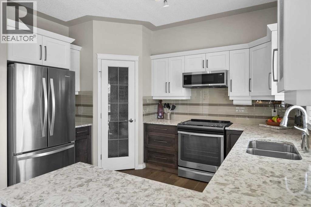 139 Country Hills Gardens NW, Calgary, Alberta  T3K 5G1 - Photo 6 - A2305904