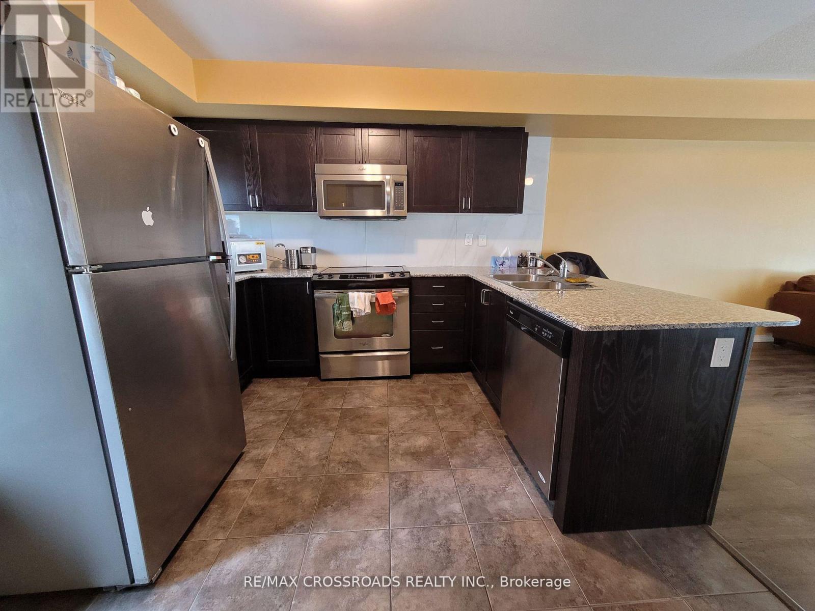 202 - 134 Widdicombe Hill Boulevard, Toronto, Ontario  M9R 0A9 - Photo 4 - W13101254