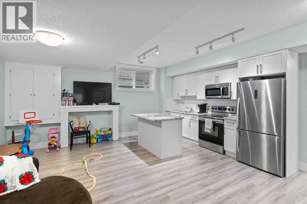 148 Baysprings Court Sw, Airdrie, Alberta  T4B 3X7 - Photo 39 - A2299469