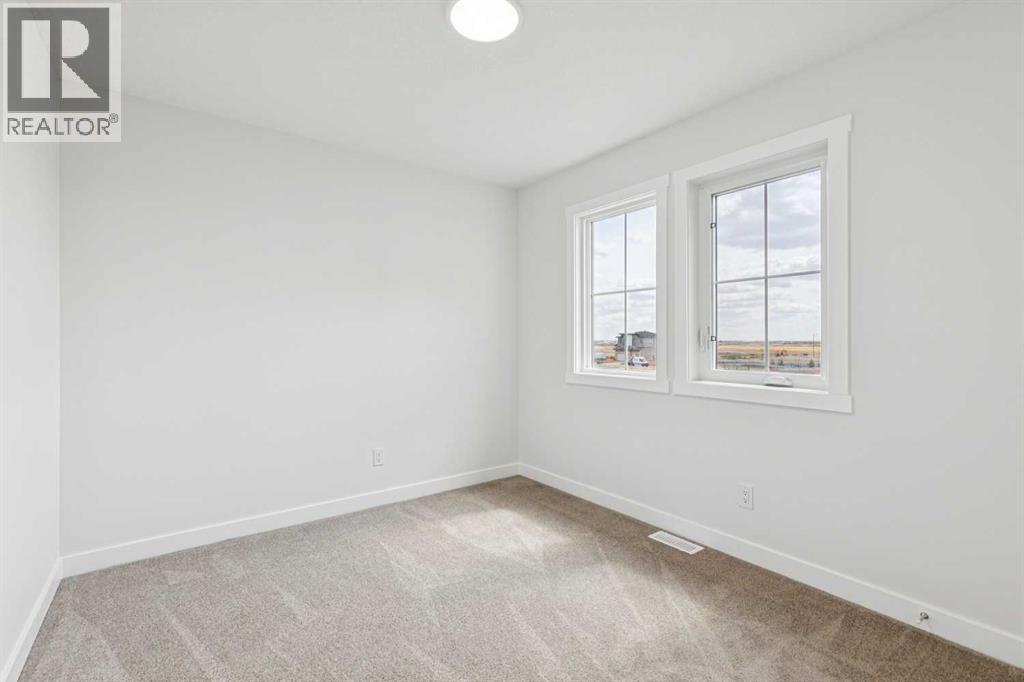 10 Quartz Gate, Balzac, Alberta  T4B 5T7 - Photo 31 - A2308649