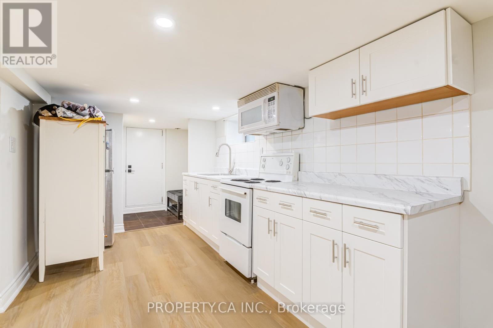 Basement - 242 Emerson Avenue, Toronto, Ontario M6H 3T6 - Photo 18 - W13102204