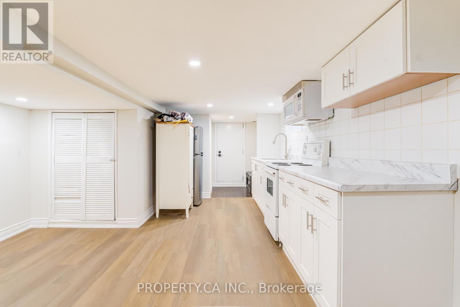 Basement - 242 Emerson Avenue, Toronto, Ontario M6H 3T6 - Photo 19 - W13102204