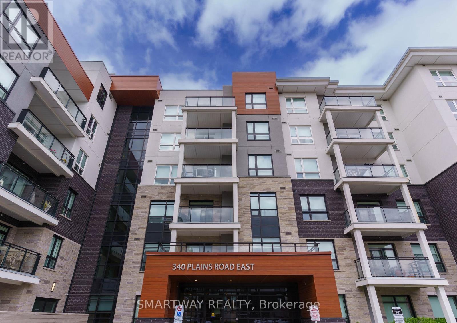 203 - 340 Plains Road E, Burlington, Ontario  L7T 0C2 - Photo 1 - W13102398