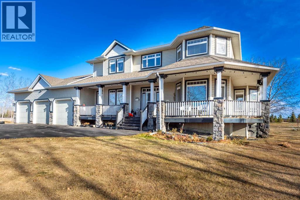 263140 Butte Hills Way, Rural Rocky View County, Alberta  T4A 0P6 - Photo 2 - A2308600