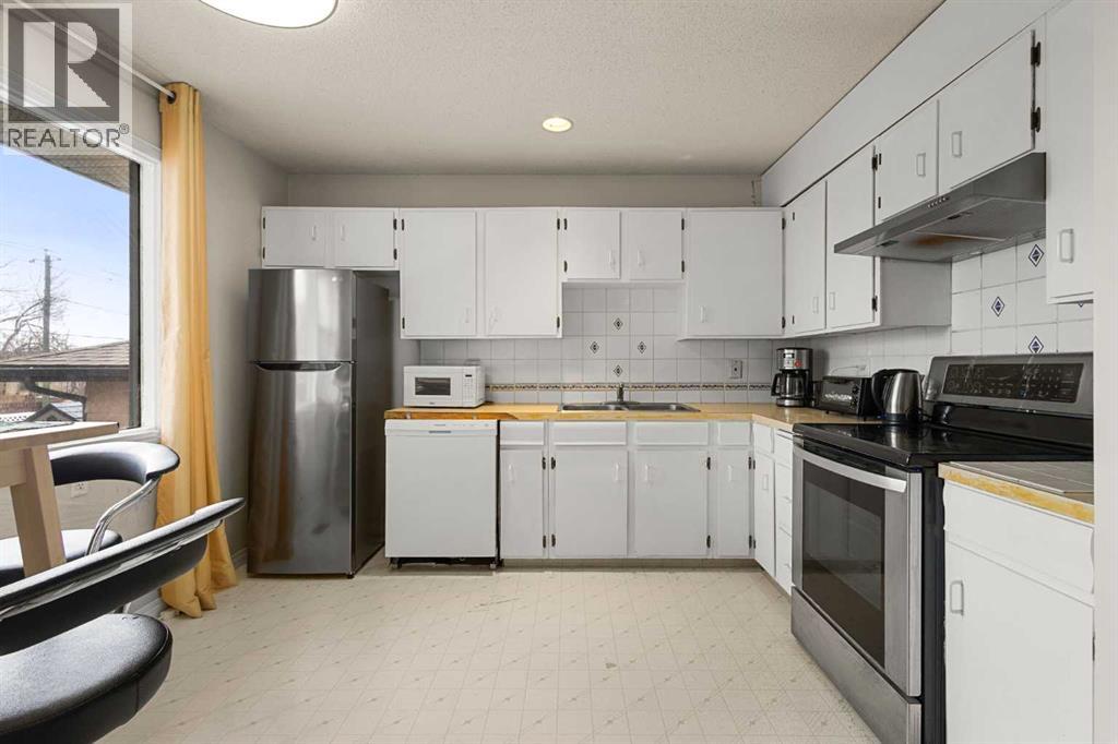 214 Huntington Close Ne, Calgary, Alberta  T2K 5B2 - Photo 7 - A2299935