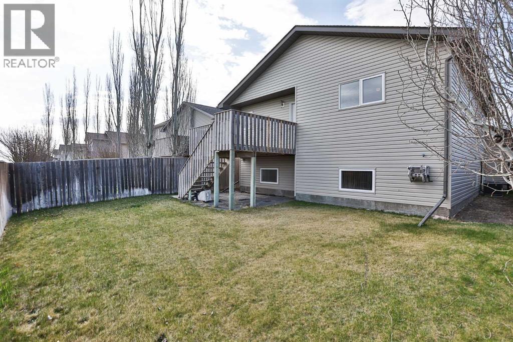 404 Lynx Crescent N, Lethbridge, Alberta  T1H 6X6 - Photo 4 - A2309111