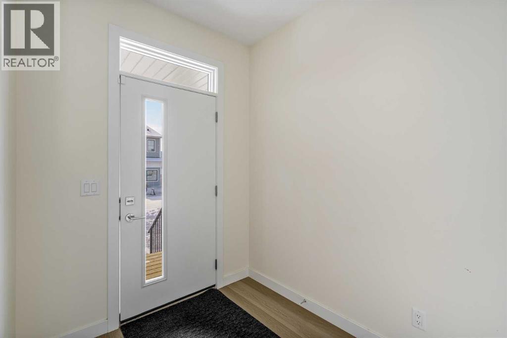 1308 South Point Parade Sw, Airdrie, Alberta  T4B 5P3 - Photo 3 - A2303821