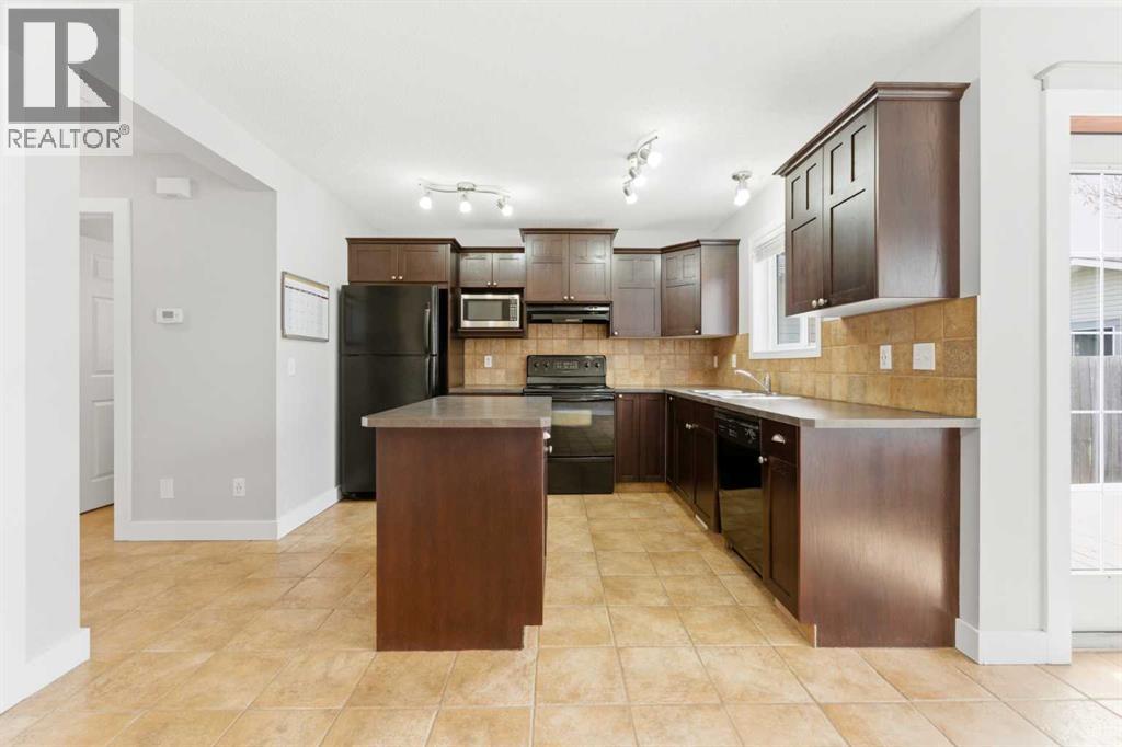 25 Everridge Way Sw, Calgary, Alberta  T2Y 4S1 - Photo 6 - A2309115