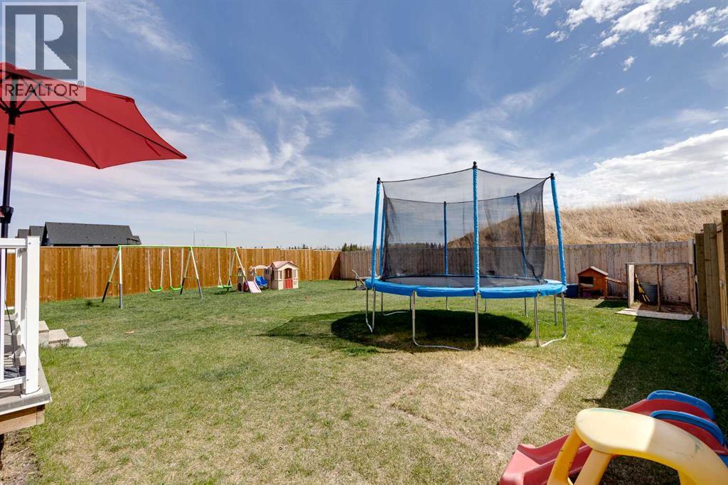 1436 Scarlett Ranch Boulevard, Carstairs, Alberta  T0M 0N0 - Photo 36 - A2309458