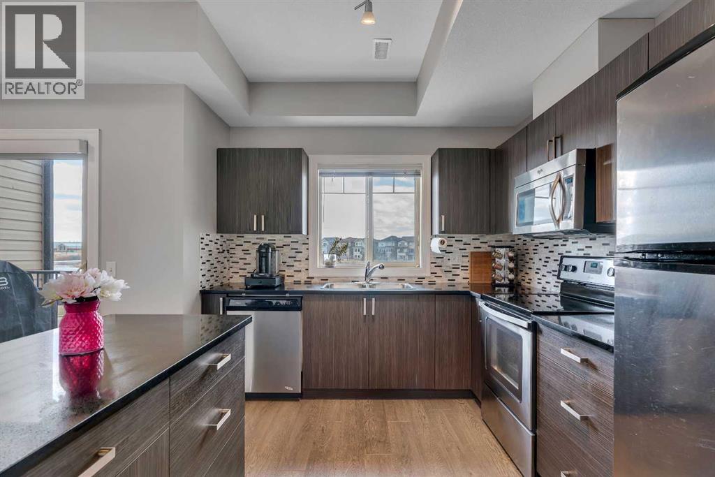 414, 121 Copperpond Common Se, Calgary, Alberta  T2Z 5B6 - Photo 3 - A2298751