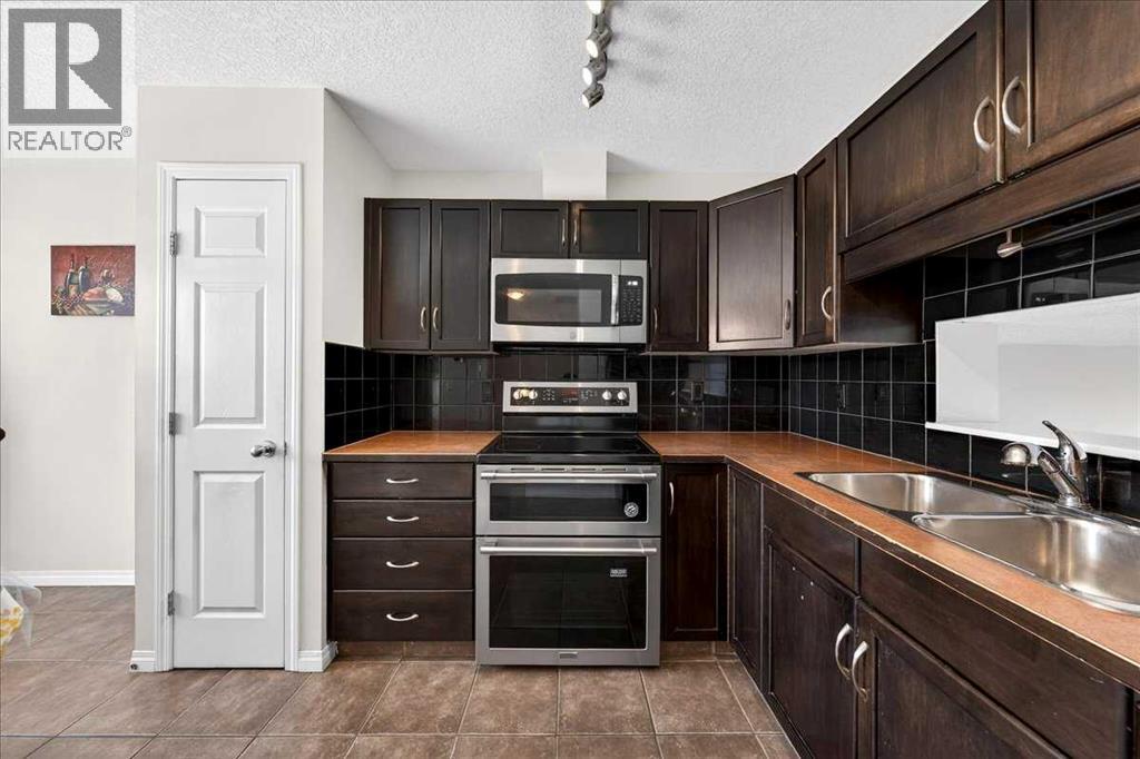 99 Copperfield Court SE, Calgary, Alberta  T2Z 4Z3 - Photo 9 - A2291197