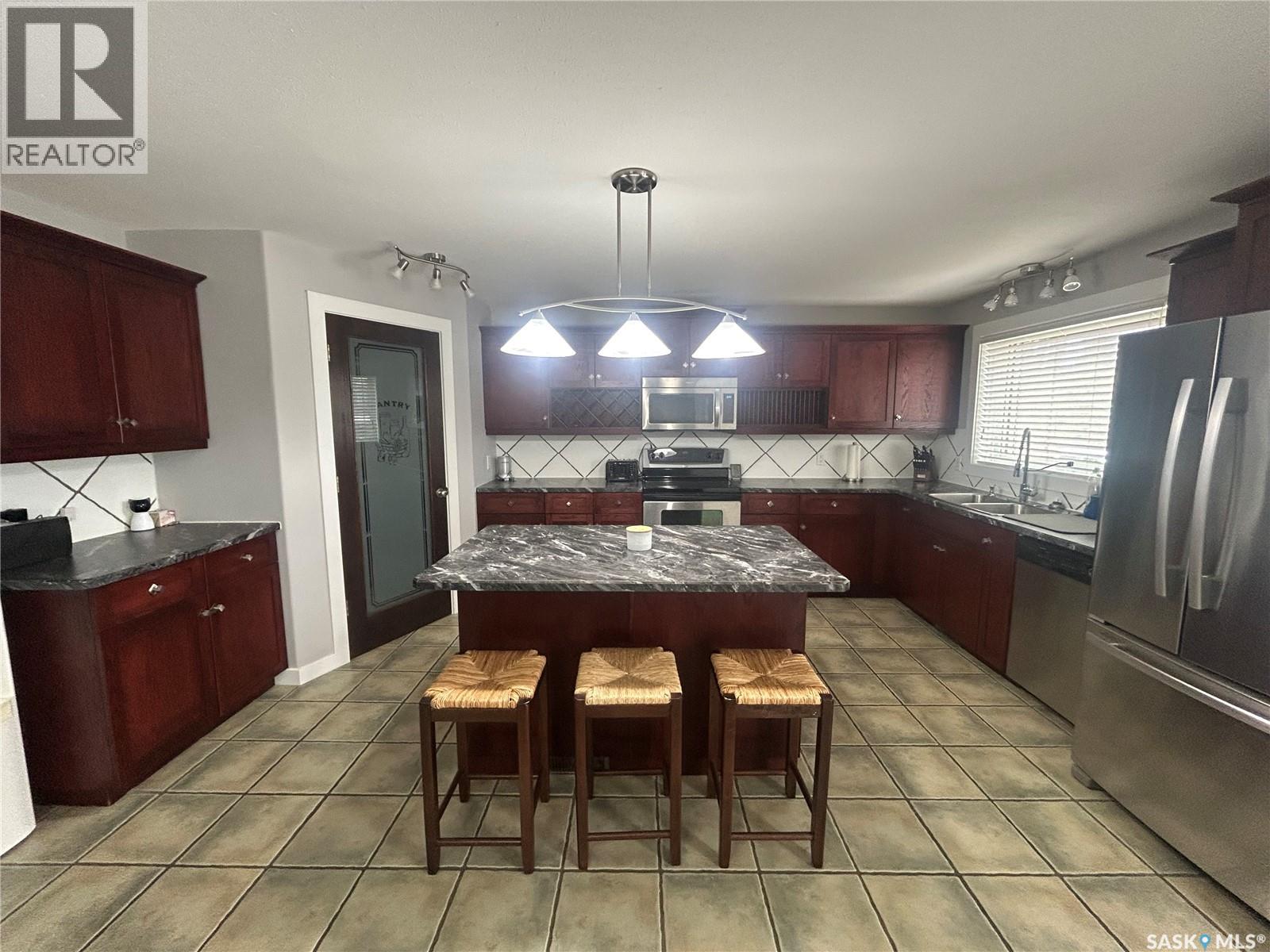 219 Crawford Avenue W, Melfort, Saskatchewan  S0E 1A0 - Photo 3 - SK035282