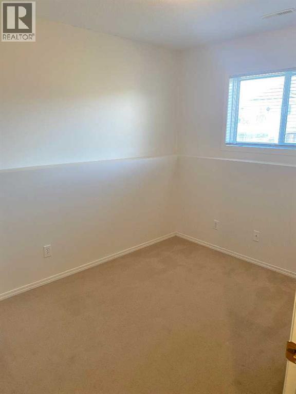 3, 15 Highlands Place W, Lethbridge, Alberta  T1J 4X8 - Photo 4 - A2309552