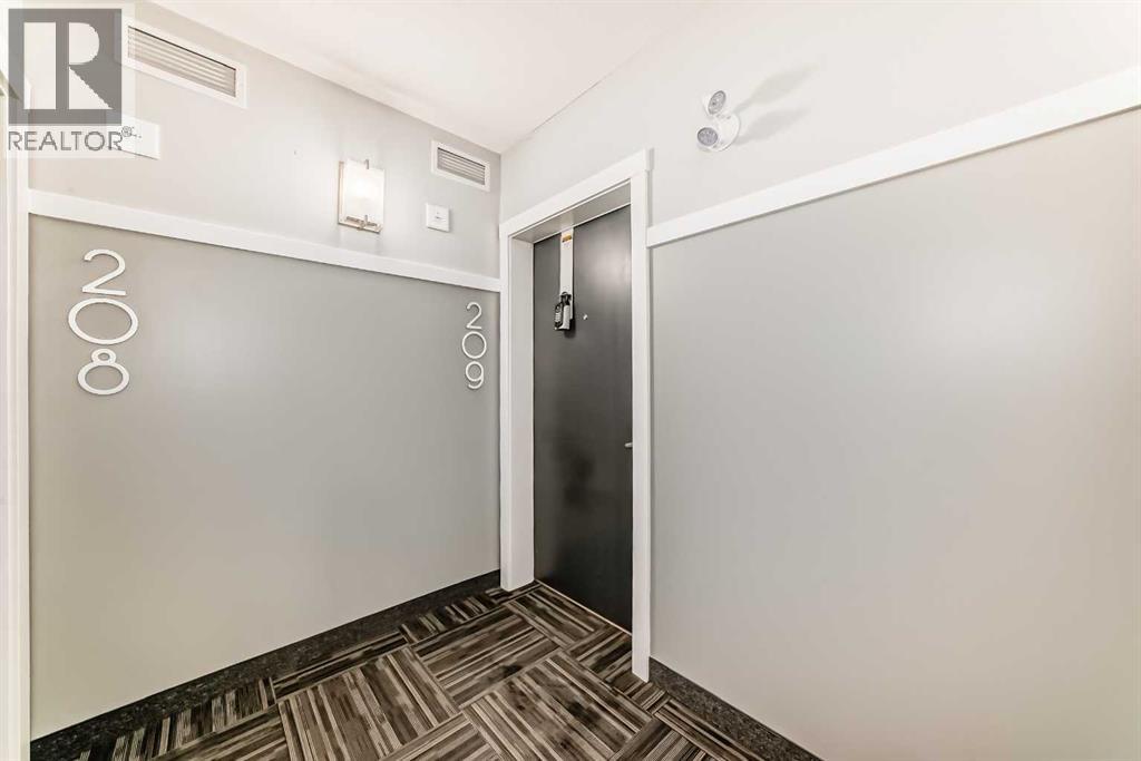 209, 4250 Seton Drive SE, Calgary, Alberta  T3M 3B7 - Photo 32 - A2291492