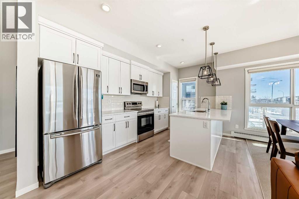 209, 4250 Seton Drive SE, Calgary, Alberta  T3M 3B7 - Photo 4 - A2291492