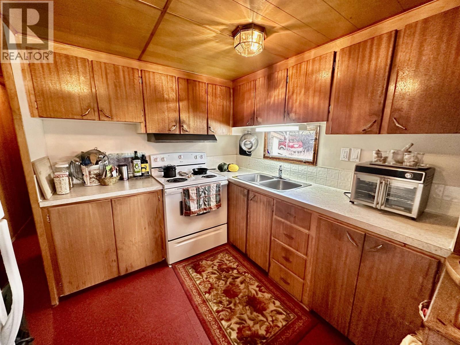 6808 Stokes Road, 100 Mile House, British Columbia  V0K 2E2 - Photo 2 - R3121458