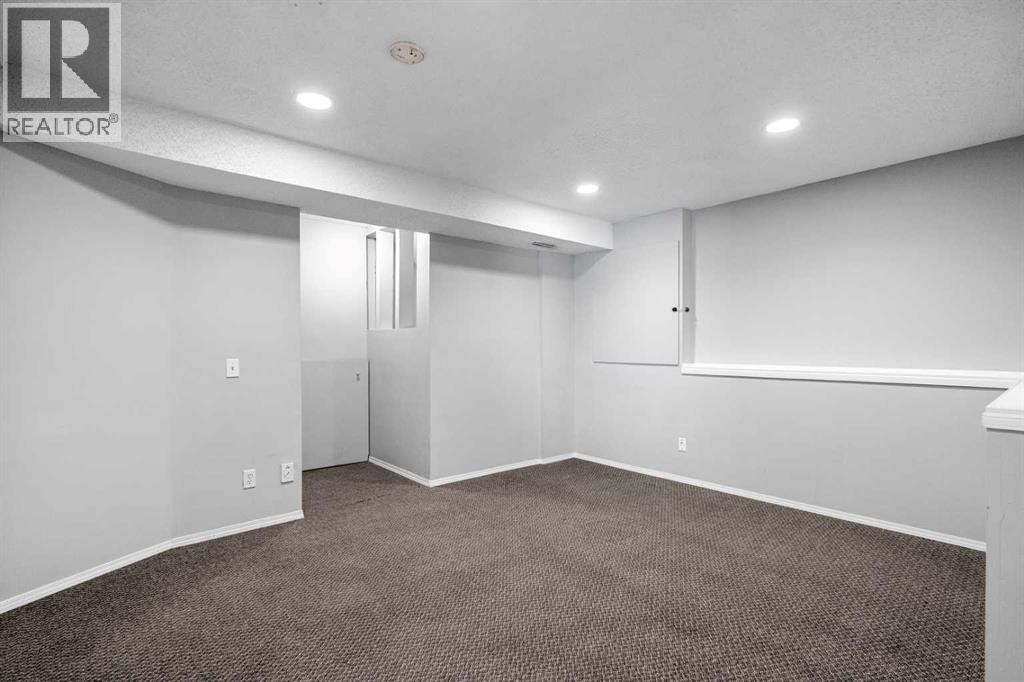 14700 Mt Mckenzie Drive Se, Calgary, Alberta  T2Z 2V1 - Photo 25 - A2306808
