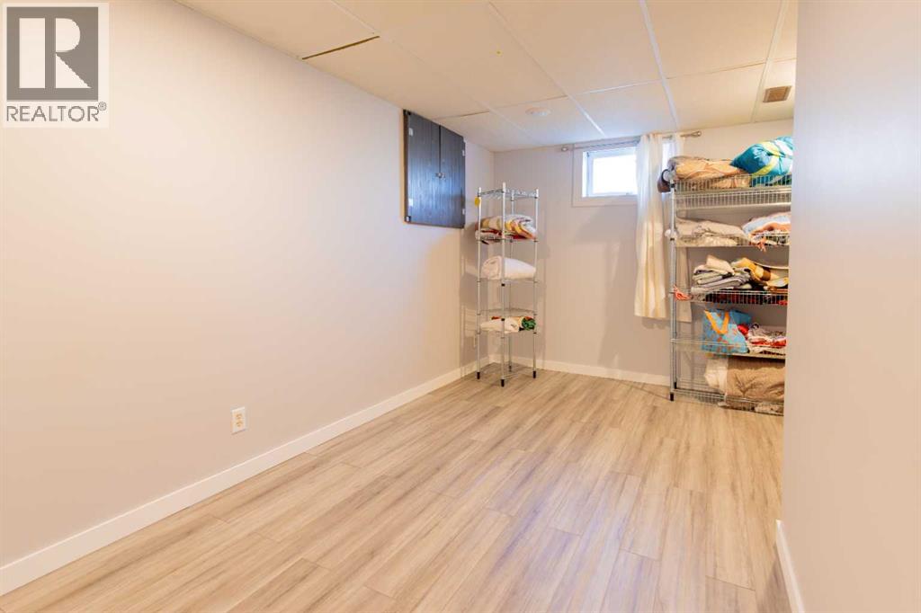 1047 Lakemount Boulevard S, Lethbridge, Alberta  T1K 3S6 - Photo 34 - A2308147
