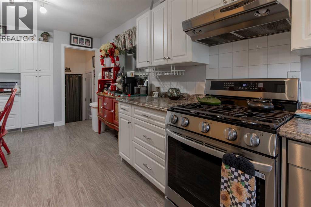 1047 Lakemount Boulevard S, Lethbridge, Alberta  T1K 3S6 - Photo 14 - A2308147