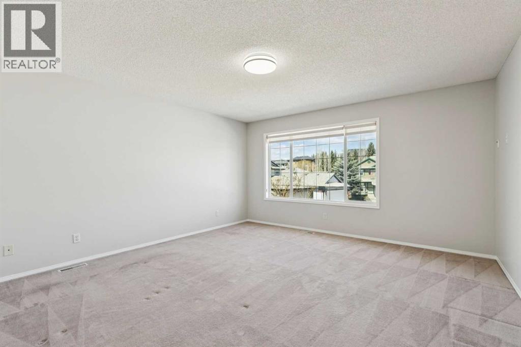 15 Springbank View SW, Calgary, Alberta  T3H 4J5 - Photo 23 - A2304465
