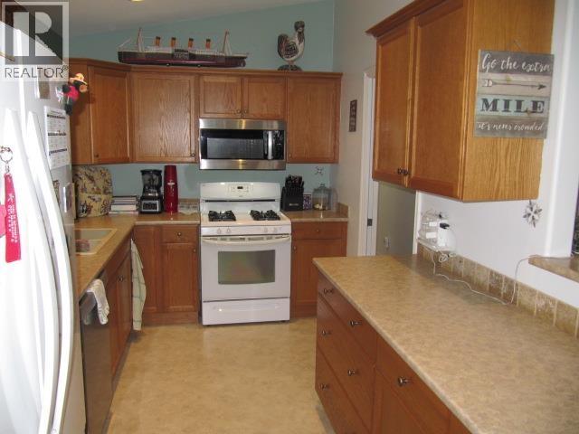 5031 Easzee Drive, 108 Mile Ranch, British Columbia  V0K 2Z0 - Photo 17 - R3121472