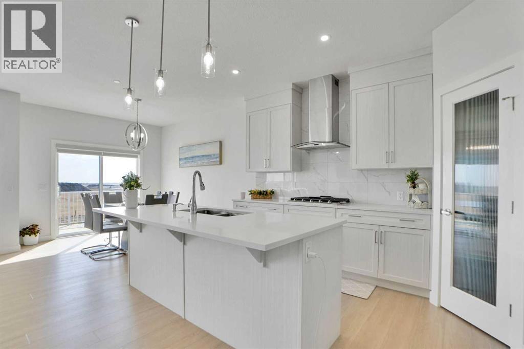 126 Hotchkiss Manor Se, Calgary, Alberta  T3S 0G1 - Photo 6 - A2309548