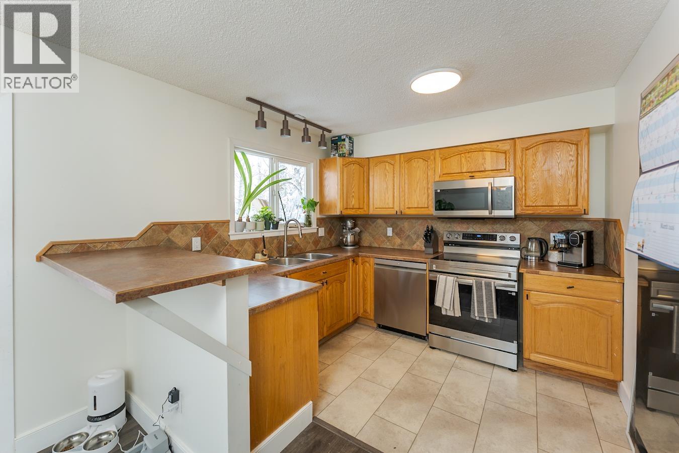 7104 Hartford Crescent, Prince George, British Columbia  V2N 2V9 - Photo 10 - R3121482