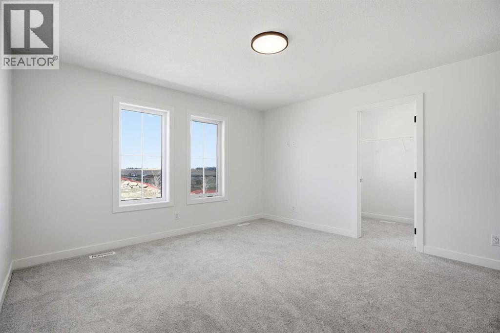 201 Bridgeport Gate, Chestermere, Alberta  T1X 3E2 - Photo 26 - A2304307