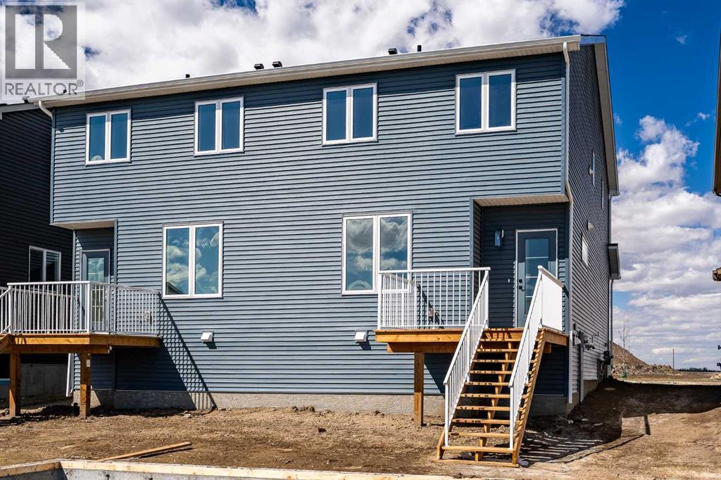 201 Bridgeport Gate, Chestermere, Alberta  T1X 3E2 - Photo 37 - A2304307