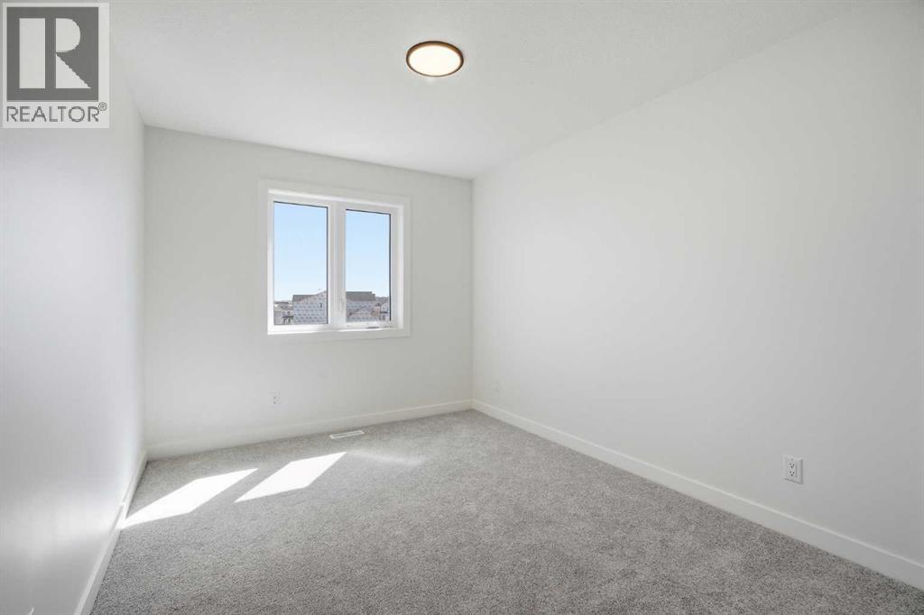 201 Bridgeport Gate, Chestermere, Alberta  T1X 3E2 - Photo 32 - A2304307