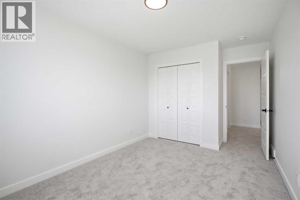 201 Bridgeport Gate, Chestermere, Alberta  T1X 3E2 - Photo 33 - A2304307