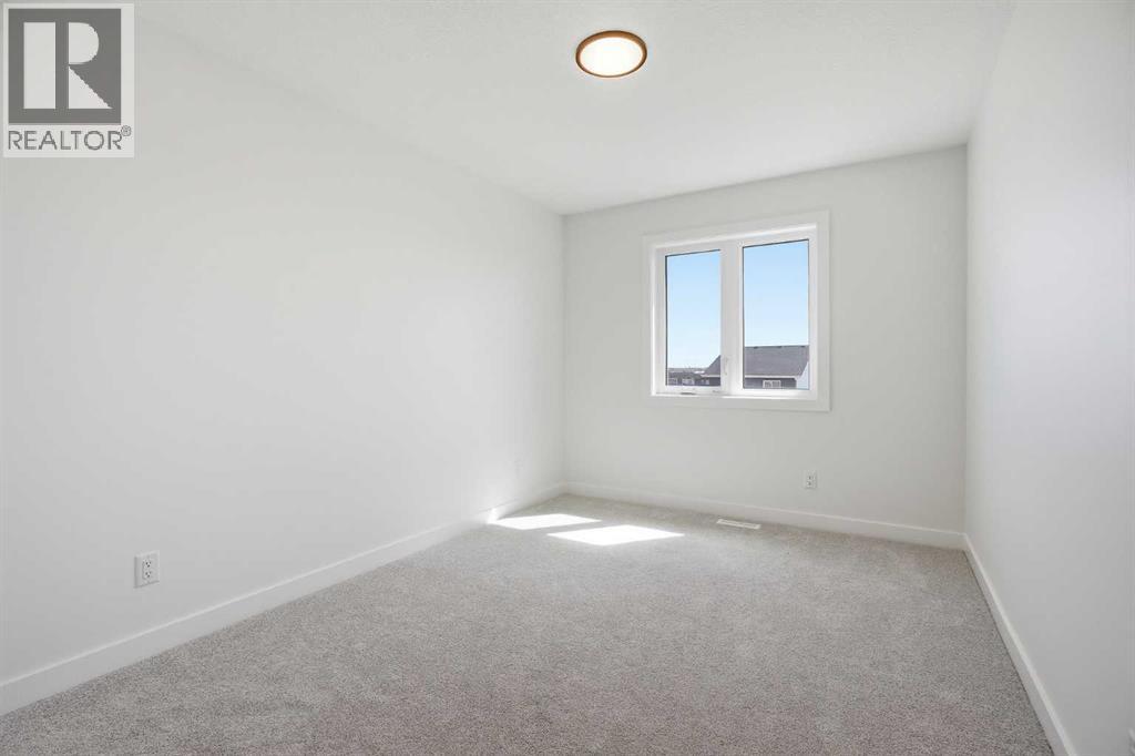 201 Bridgeport Gate, Chestermere, Alberta  T1X 3E2 - Photo 30 - A2304307