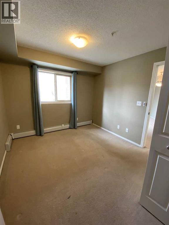 8104, 403 Mackenzie Way SW, Airdrie, Alberta  T4B 3V7 - Photo 16 - A2309384