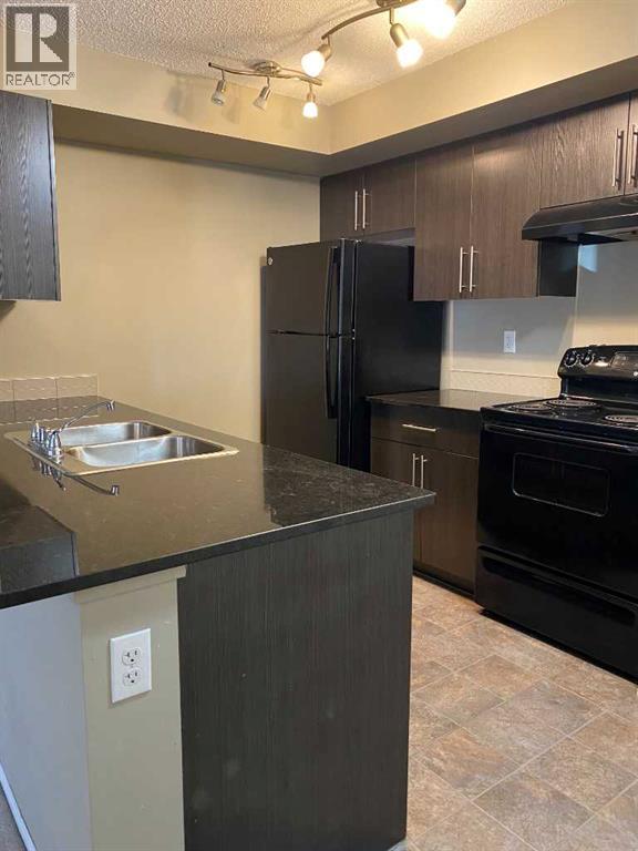 8104, 403 Mackenzie Way SW, Airdrie, Alberta  T4B 3V7 - Photo 6 - A2309384