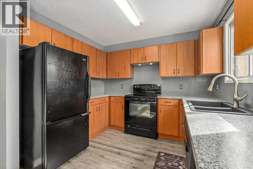 19 Bernard Drive NW, Calgary, Alberta  T3K 2B4 - Photo 11 - A2304566
