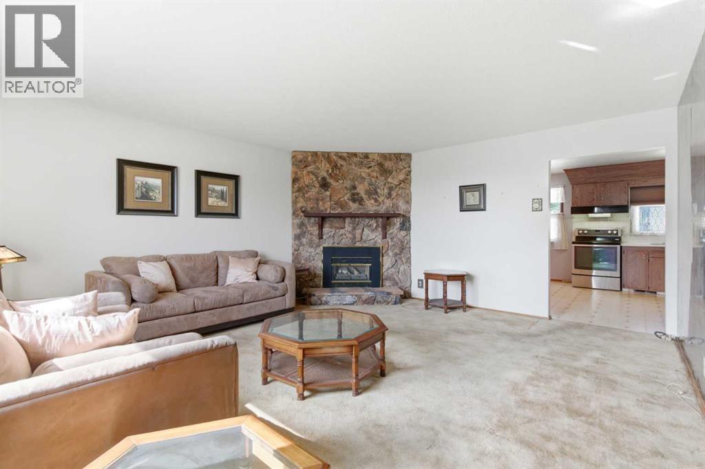 6215 Thorncliffe Drive NW, Calgary, Alberta  T2K 3A6 - Photo 6 - A2308292