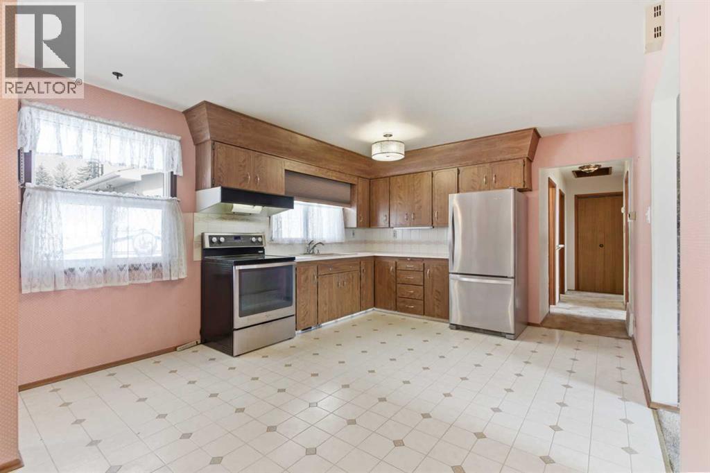 6215 Thorncliffe Drive NW, Calgary, Alberta  T2K 3A6 - Photo 8 - A2308292